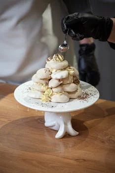 pastry chef decorating desserts
